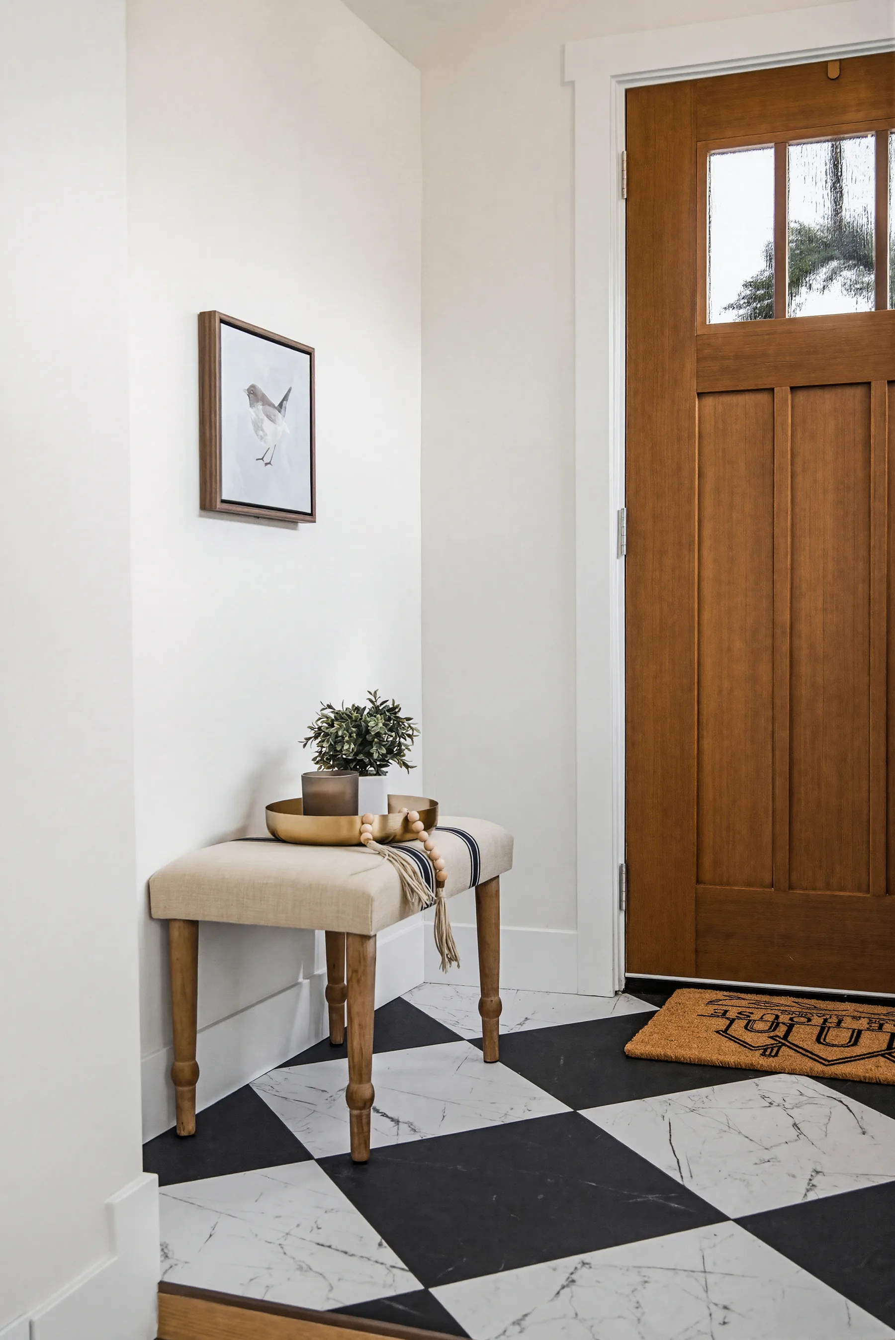A styled entryway detail in a home staged by Style House